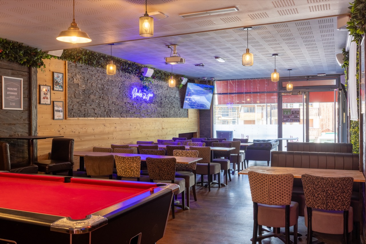 The Rhodos bar, pool table and booths