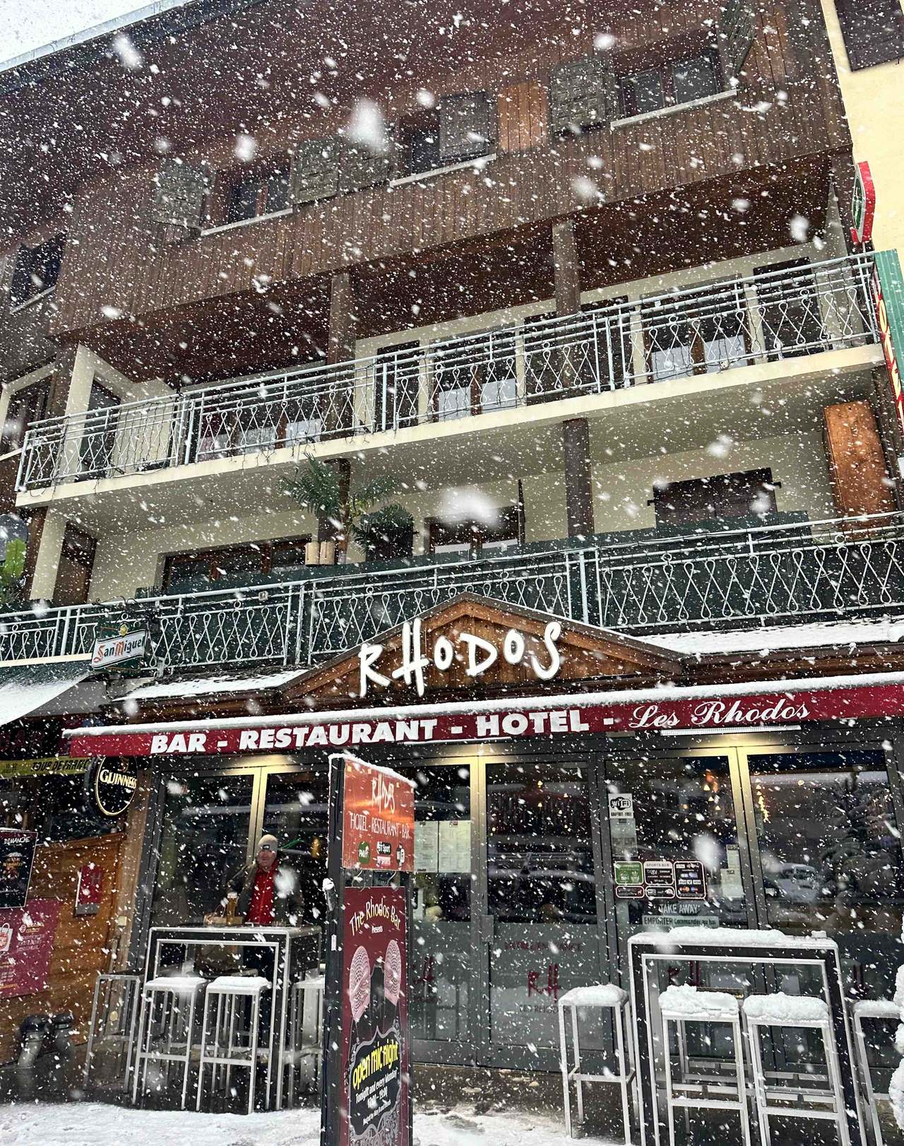 Snow falling outside the Rhodos bar and restaurant